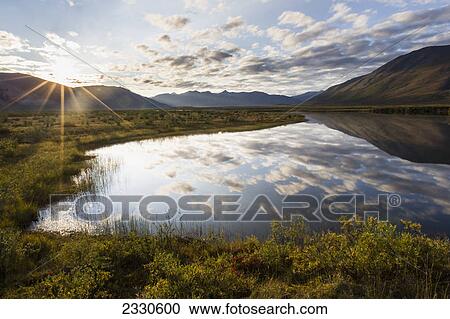 Clouds reflected in noatak river and brooks range gates of the arctic national park northwestern alaska; Alaska united states of america View Large Photo Image Stock Image - Clouds reflected in noatak river and brooks range gates of the arctic national park northwestern alaska; Alaska united states of america. Fotosearch