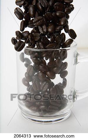 Coffee Beans Pour Into Clear Coffee Cup View Large Photo Image Stock Image - Coffee Beans Pour Into Clear Coffee Cup. Fotosearch