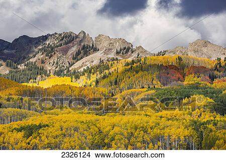 Colorado, Ohio Pass, Colorful Autumn landscape, Dramatic clouds and mountains in distance. View Large Photo Image Picture - Colorado, Ohio Pass, Colorful Autumn landscape, Dramatic clouds and mountains in distance.. Fotosearch