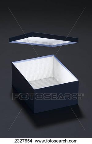 Conceptual photo of an illuminated box with a floating lid; Tarifa cadiz spain View Large Photo Image Picture - Conceptual photo of an illuminated box with a floating lid; Tarifa cadiz spain. Fotosearch