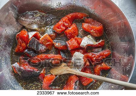 Cooking salmon in a pan; Anchorage, Alaska, United States of America View Large Photo Image Stock Photo - Cooking salmon in a pan; Anchorage, Alaska, United States of America. Fotosearch
