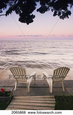 Stock Photo - Cottage Chair At Lake Manitoba, Canada. Fotosearch