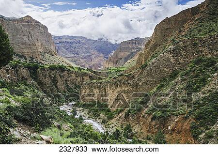 Deep mountain river canyon between nepalese villages samar and gemi; Upper mustang region nepal View Large Photo Image Stock Image - Deep mountain river canyon between nepalese villages samar and gemi; Upper mustang region nepal. Fotosearch
