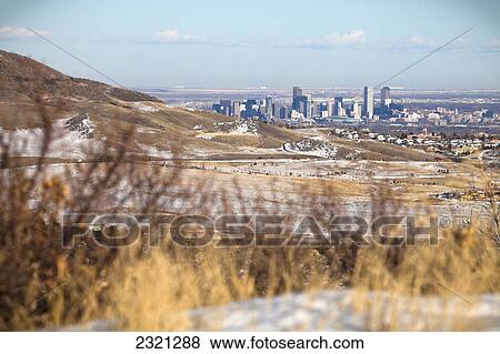 Stock Photo - Denver Skyline As Seen From Red Rocks Amphitheater; Denver Colorado United States Of America. Fotosearch