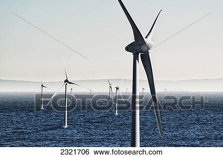 Stock Photograph - Digital Composite Of Wind Turbines On The Water; Tarifa Cadiz Andalusia Spain. Fotosearch