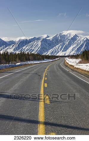 Driver's view of the alaska highway southwest of kluane lake; Yukon canada View Large Photo Image Stock Image - Driver's view of the alaska highway southwest of kluane lake; Yukon canada. Fotosearch