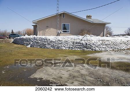 Dyke Of Sandbags Around Rural Home To Protect From Red River Floodwaters, Rural Manitoba View Large Photo Image Stock Image - Dyke Of Sandbags Around Rural Home To Protect From Red River Floodwaters, Rural Manitoba. Fotosearch