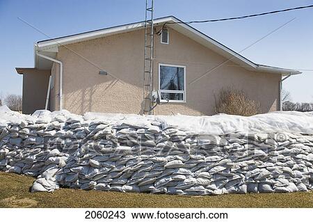 Dyke Of Sandbags Around Rural Home To Protect From Red River Floodwaters, Rural Manitoba View Large Photo Image Stock Image - Dyke Of Sandbags Around Rural Home To Protect From Red River Floodwaters, Rural Manitoba. Fotosearch