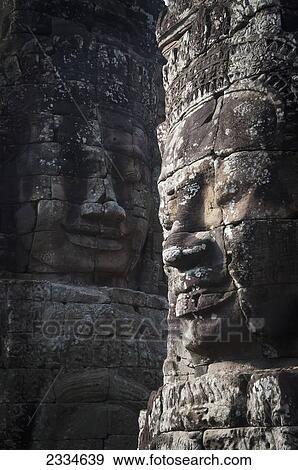 Face sculptures on stone walls at Angkor Wat; Cambodia View Large Photo Image Stock Photo - Face sculptures on stone walls at Angkor Wat; Cambodia. Fotosearch