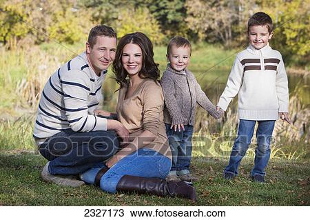 Family portrait in autumn; St. albert alberta canada View Large Photo Image Stock Image - Family portrait in autumn; St. albert alberta canada. Fotosearch