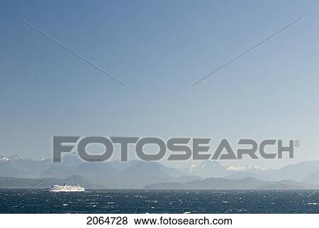 Ferry Boat Makes A Crossing In Rough Seas With Mountains In The Background, Bc Ferries, Nanaimo, Bc, Canada View Large Photo Image Stock Photo - Ferry Boat Makes A Crossing In Rough Seas With Mountains In The Background, Bc Ferries, Nanaimo, Bc, Canada. Fotosearch