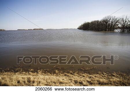 Floodwaters From Red River Make Field Look Like A Lake, Rural Manitoba View Large Photo Image Stock Photograph - Floodwaters From Red River Make Field Look Like A Lake, Rural Manitoba. Fotosearch