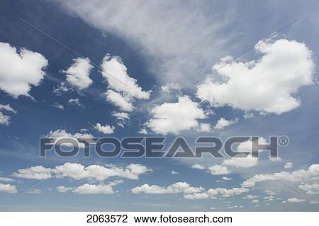 Fluffy Clouds In Blue Sky; Canada, Manitoba, Erickson View Large Photo Image Stock Image - Fluffy Clouds In Blue Sky; Canada, Manitoba, Erickson. Fotosearch