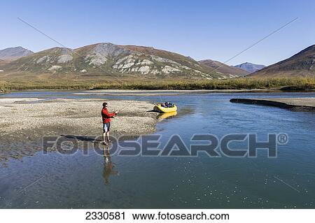 Fly fishing in the noatak river and brooks range gates of the arctic national park northwestern alaska; Alaska united states of america View Large Photo Image Stock Image - Fly fishing in the noatak river and brooks range gates of the arctic national park northwestern alaska; Alaska united states of america. Fotosearch