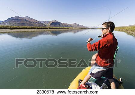 Stock Photo - Fly fishing in the noatak river and brooks range gates of the arctic national park northwestern alaska; Alaska united states of america. Fotosearch