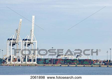 Freighters Load Up With Cargo At The Delta, Bc Port View Large Photo Image Stock Photo - Freighters Load Up With Cargo At The Delta, Bc Port. Fotosearch