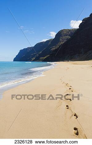 Stock Photo - Hawaii, Kauai, Polihale Beach, Footprints in sand.. Fotosearch