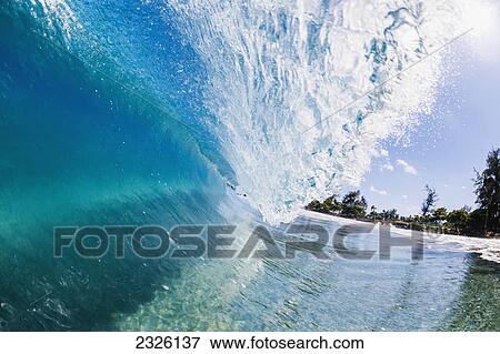 Hawaii, Maui, Hana, Beautiful blue wave breaking. View Large Photo Image Stock Photo - Hawaii, Maui, Hana, Beautiful blue wave breaking.. Fotosearch