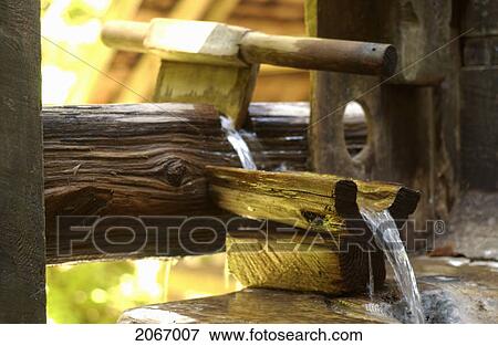 Stock Photo - Hollowed Out Cedar Logs Transport Hot Spring Water Into Hollowed Out Cedar Log Tubs, Bagby Hot Springs, Estacada, Oregon, Usa. Fotosearch