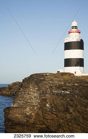 Hook head lighthouse; Hood head county wexford ireland View Large Photo Image Stock Photo - Hook head lighthouse; Hood head county wexford ireland. Fotosearch