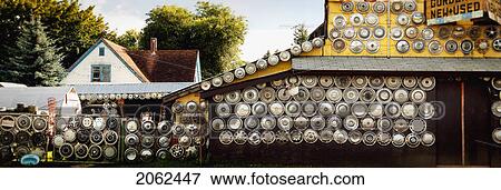 Stock Photo - Hubcap Collection, Enderby, B. C.. Fotosearch