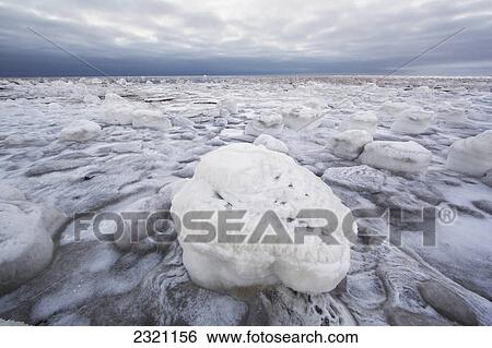 Stock Photograph - Ice Covered Rock Along The Shores Of Hudson's Bay Outside Churchill; Manitoba Canada. Fotosearch