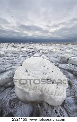 Ice Covered Rock Along The Shores Of Hudson's Bay Outside Churchill; Manitoba Canada View Large Photo Image Stock Photography - Ice Covered Rock Along The Shores Of Hudson's Bay Outside Churchill; Manitoba Canada. Fotosearch