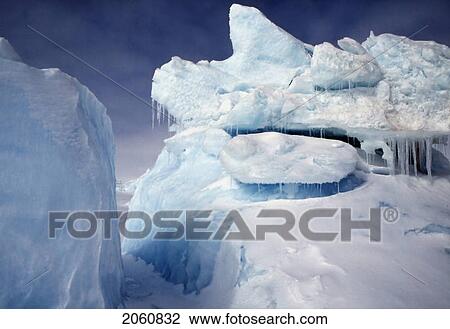 Iceberg Frozen Into The Arctic Ocean Near Griffith Island, Nunavut In The Canadian High Arctic. View Large Photo Image Stock Image - Iceberg Frozen Into The Arctic Ocean Near Griffith Island, Nunavut In The Canadian High Arctic.. Fotosearch