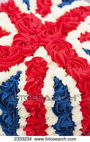 Picture - Icing on cake in union jack design as part of village celebration of the queen's diamond jubilee; Great wilbraham cambridgeshire england. Fotosearch