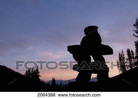 Inukshuk At Sunset On The Skyline Trail In Jasper National Park. The Inukshuk Is The Official Symbol Of The 2010 Vancouver Olympic Winter Games View Large Photo Image Stock Photo - Inukshuk At Sunset On The Skyline Trail In Jasper National Park. The Inukshuk Is The Official Symbol Of The 2010 Vancouver Olympic Winter Games. Fotosearch
