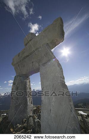 Inukshuk Statue At The Peak On Whistler Mountain, Whistler, Bc, Canada View Large Photo Image Stock Image - Inukshuk Statue At The Peak On Whistler Mountain, Whistler, Bc, Canada. Fotosearch