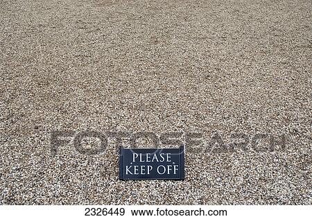 Stock Photo - Keep off sign over pebbles at blenheim palace; Woodstock oxfordshire england. Fotosearch