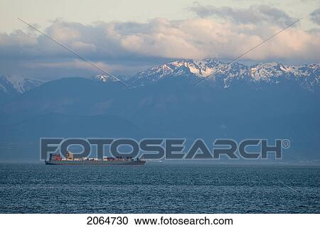 Large Container Ship In Front Of Snow-Capped Mountains, Victoria, Bc, Canada View Large Photo Image Stock Image - Large Container Ship In Front Of Snow-Capped Mountains, Victoria, Bc, Canada. Fotosearch
