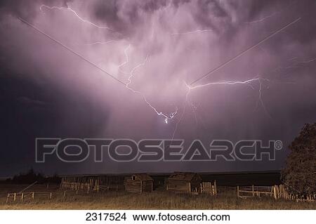 Lightning Bolt Over Some Abandoned Buildings Near Val Marie; Saskatchewan Canada View Large Photo Image Picture - Lightning Bolt Over Some Abandoned Buildings Near Val Marie; Saskatchewan Canada. Fotosearch