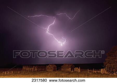Lightning Bolt Over Some Abandoned Buildings Near Val Marie; Saskatchewan Canada View Large Photo Image Stock Image - Lightning Bolt Over Some Abandoned Buildings Near Val Marie; Saskatchewan Canada. Fotosearch