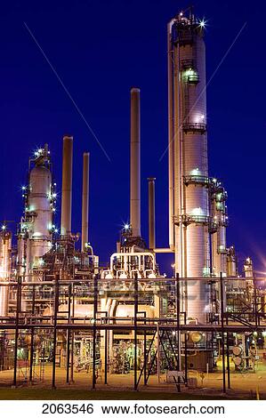Stock Photograph - Lights On Oil Refinery At Night; Canada, Alberta. Fotosearch
