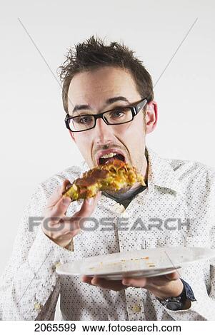 Man Eating Pizza View Large Photo Image Stock Photo - Man Eating Pizza. Fotosearch