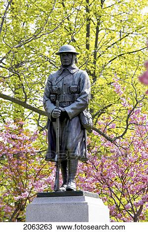 Stock Image - Memorial Statue Surrounded By Cherry Trees In Blossom, Canada, Ontario. Fotosearch