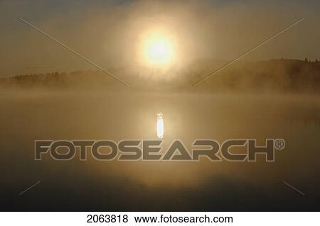 Mist And Sunrise At Étang-À-La-Truite (Trout Pond), Gaspesie, Quebec View Large Photo Image Stock Photo - Mist And Sunrise At Étang-À-La-Truite (Trout Pond), Gaspesie, Quebec. Fotosearch