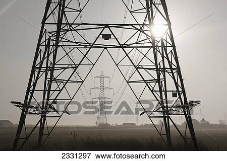 Stock Photo - Misty morning at the little cheyne court wind farm at romney marsh; Kent east sussex england. Fotosearch