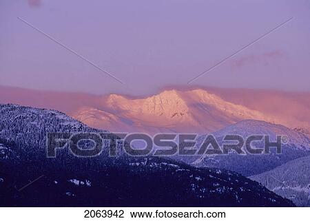 Mt. Currie Is Lit By Pink Alpenglow, Whistler, Bc Canada View Large Photo Image Stock Image - Mt. Currie Is Lit By Pink Alpenglow, Whistler, Bc Canada. Fotosearch