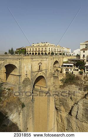 New bridge over el tajo gorge with parador de ronda in the background; Ronda malaga andalusia spain View Large Photo Image Stock Photography - New bridge over el tajo gorge with parador de ronda in the background; Ronda malaga andalusia spain. Fotosearch
