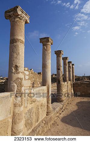 Old columns in a row against a blue sky with clouds; Paphos cyprus View Large Photo Image Stock Image - Old columns in a row against a blue sky with clouds; Paphos cyprus. Fotosearch