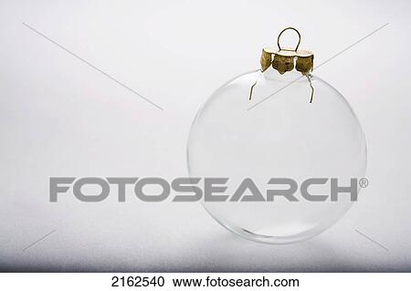 One Clear Transparent Christmas Tree Bulb Ornament On White Background Studio Portrait View Large Photo Image Stock Image - One Clear Transparent Christmas Tree Bulb Ornament On White Background Studio Portrait. Fotosearch