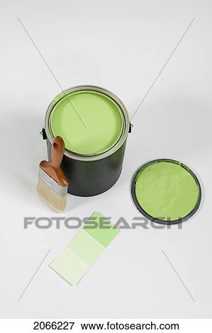 Stock Photo - Open Paint Can, Lid, Colour Swatch And Brush, Canada, British Columbia. Fotosearch
