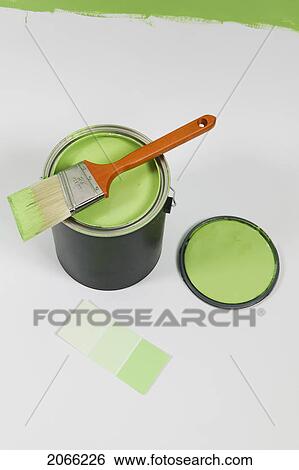 Stock Photograph - Open Paint Can, Lid, Colour Swatch And Brush, Canada, British Columbia. Fotosearch