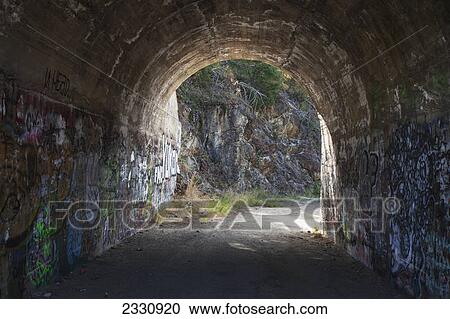 Stock Image - Opening to a tunnel; British columbia canada. Fotosearch