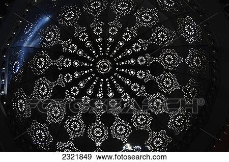Ornate Design On A Dome Ceiling With Light Filtering Through; Marrakech Morocco View Large Photo Image Stock Photo - Ornate Design On A Dome Ceiling With Light Filtering Through; Marrakech Morocco. Fotosearch