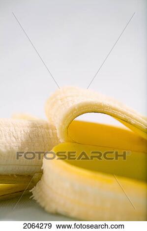 Stock Photo - Partly Peeled Banana. Fotosearch