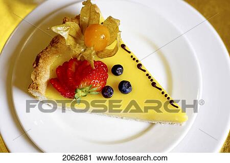 Stock Image - Piece Of Lemon Fruit Flan Dessert On White Plate. Fotosearch